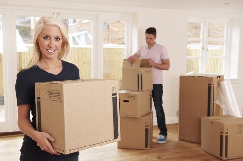 Local moving team handling furniture near Hoxton streets