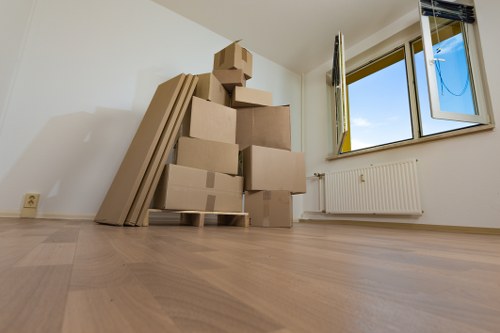 A professional office relocation team unloading equipment at a Hoxton workspace