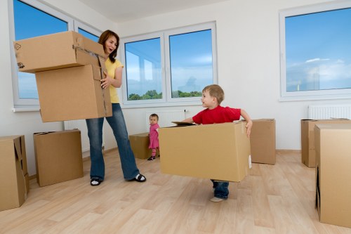 Boxes and furniture being loaded for a Hoxton man with van service