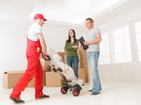 Team member reviewing workplace hazards before lifting