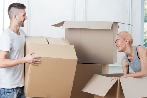 Boxes, furniture, and storage items arranged for a flexible Hoxton removal service
