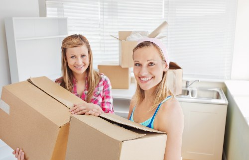 Household moving boxes and furniture prepared for a Hoxton home removal